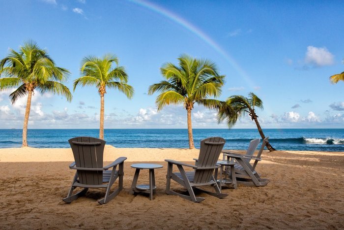 Beach chairs on the white-sand beach at Galley Bay Resort & Spa Antigua