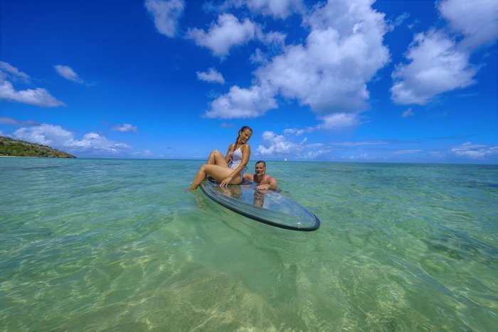 Paddleboarding in calm Caribbean water at Galley Bay Resort & Spa Antigua
