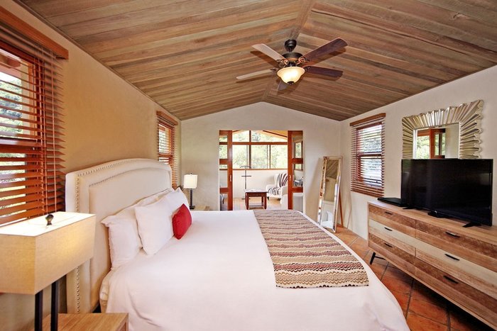 A cozy suite with wood-beam ceilings at Los Establos Boutique Resort Panama