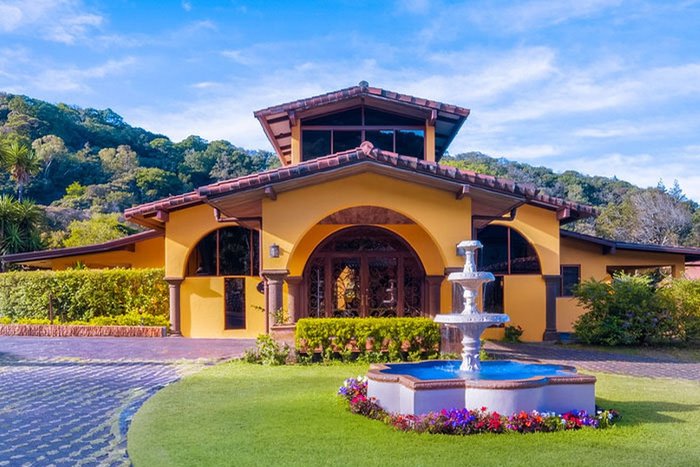A serene garden villa and fountain view at Los Establos Boutique Resort Panama