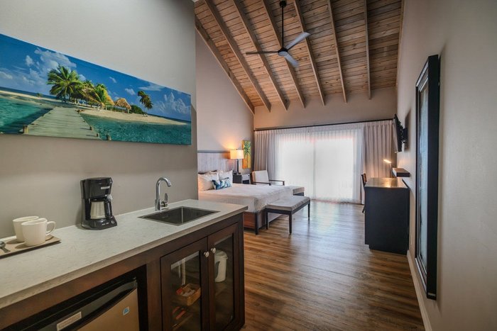 A private balcony with beach and ocean views at St. James's Club & Villas Antigua