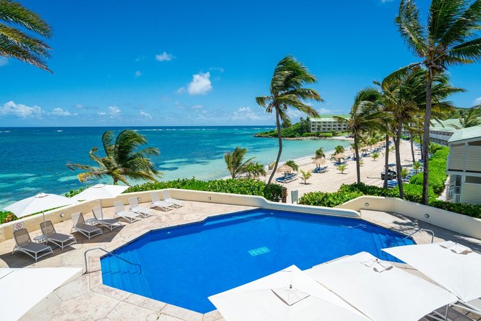 The pier and ocean view at Mamora Bay Beach, St. James's Club & Villas Antigua