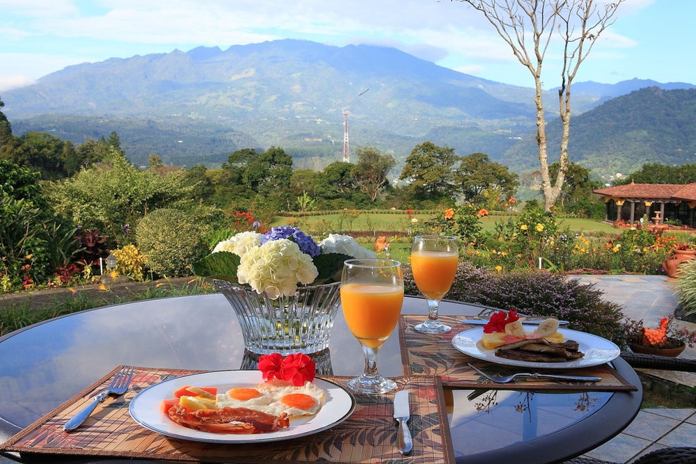 Breakfast in the gardens with views of Volcan Baru at Los Establos Boutique Resort Panama