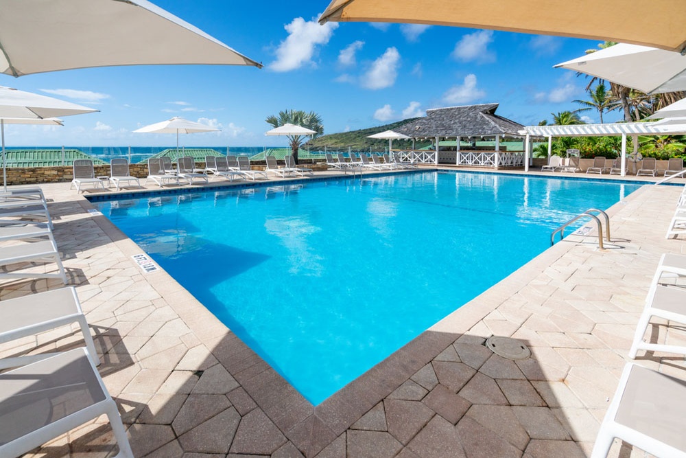 The Reef Deck pool overlooking the Caribbean at St. James's Club & Villas Antigua