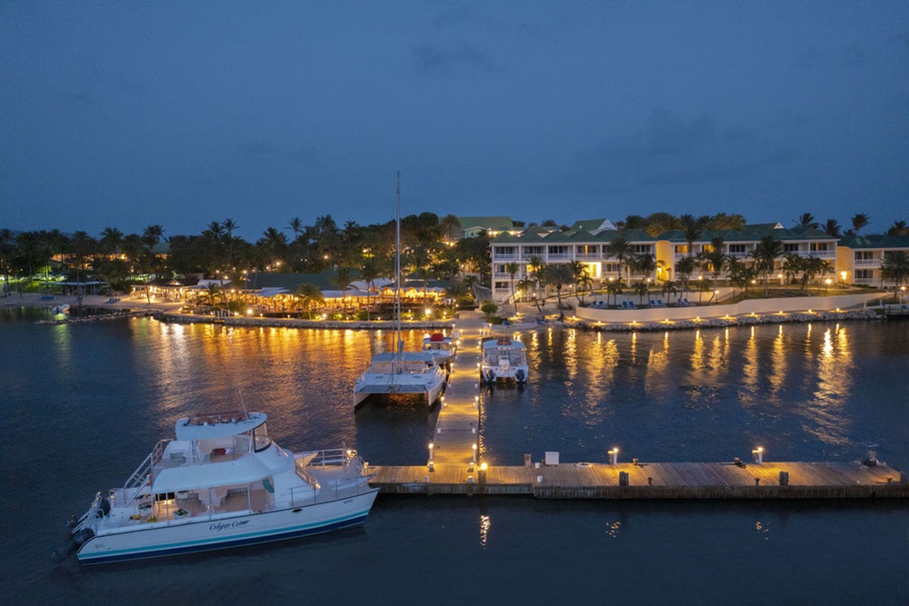 The marina lit at dusk at St. James's Club & Villas Antigua