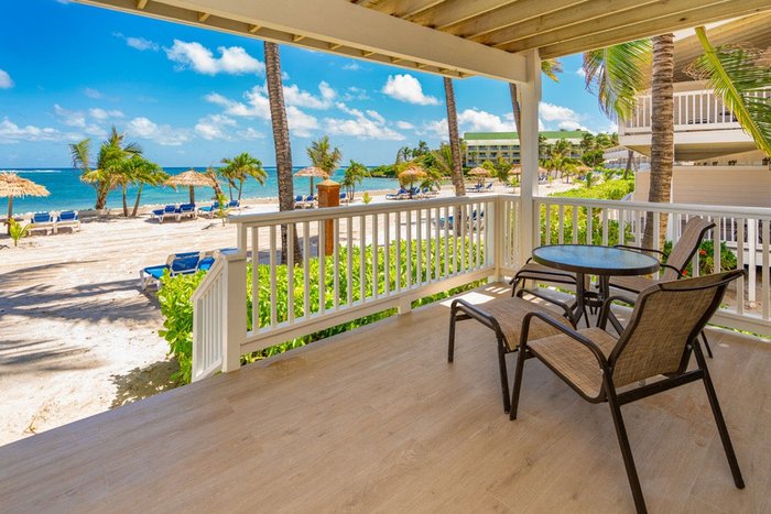 A private candlelit dinner beneath an oceanfront gazebo at St. James's Club Antigua