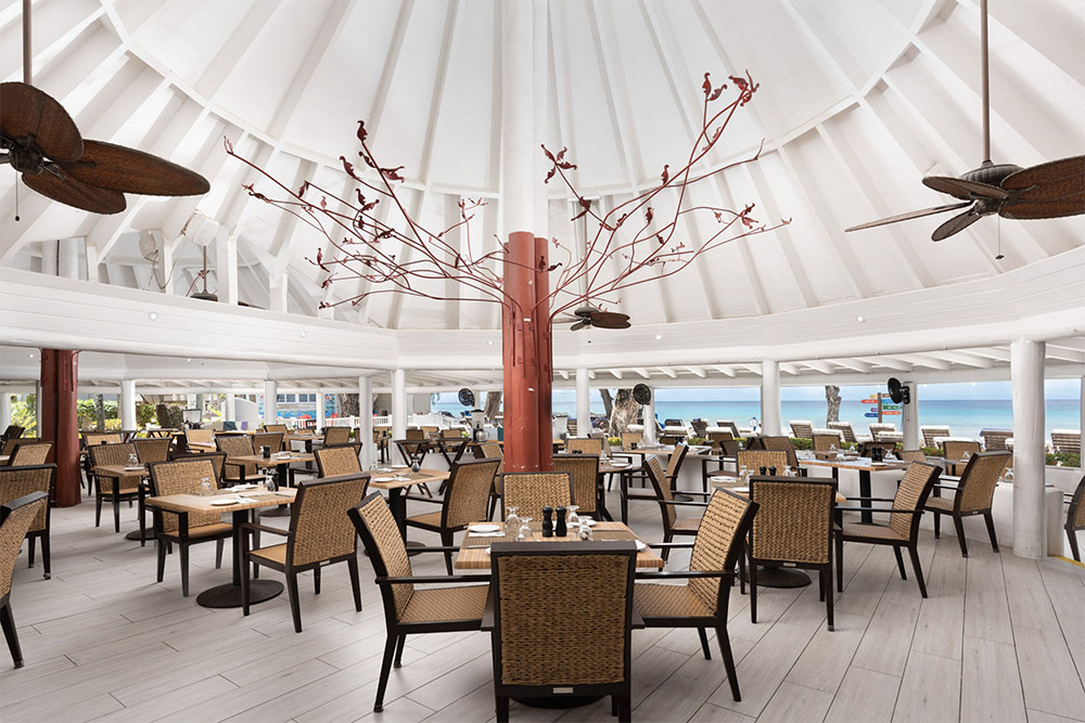 A bright oceanfront room with seaside views at The Club Barbados