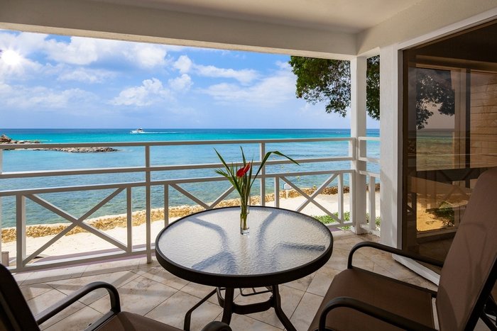 A spacious oceanfront suite with a private balcony at The Club Barbados