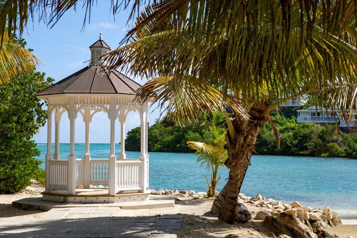Cocktails by the pool in the Caribbean sunshine at The Verandah Antigua